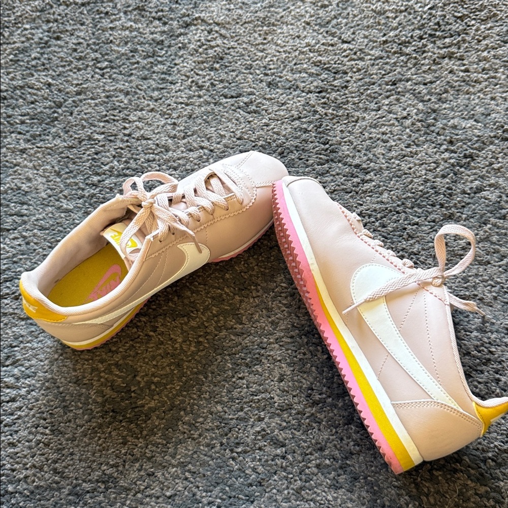 Adorable Nike pink white and yellow. Vegan?. Cute but have too many shoes! Worn